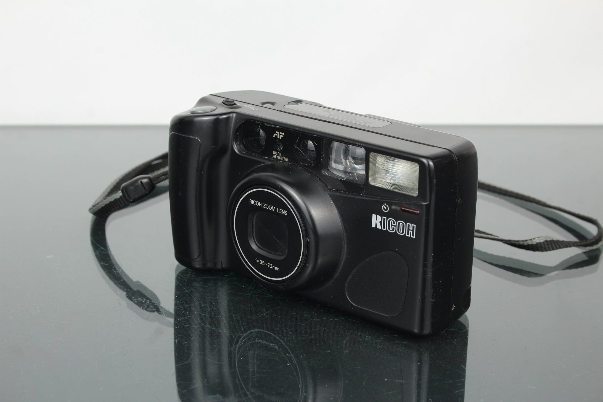 Ricoh Shotmaster Zoom 70 - Dutch|Thrift
