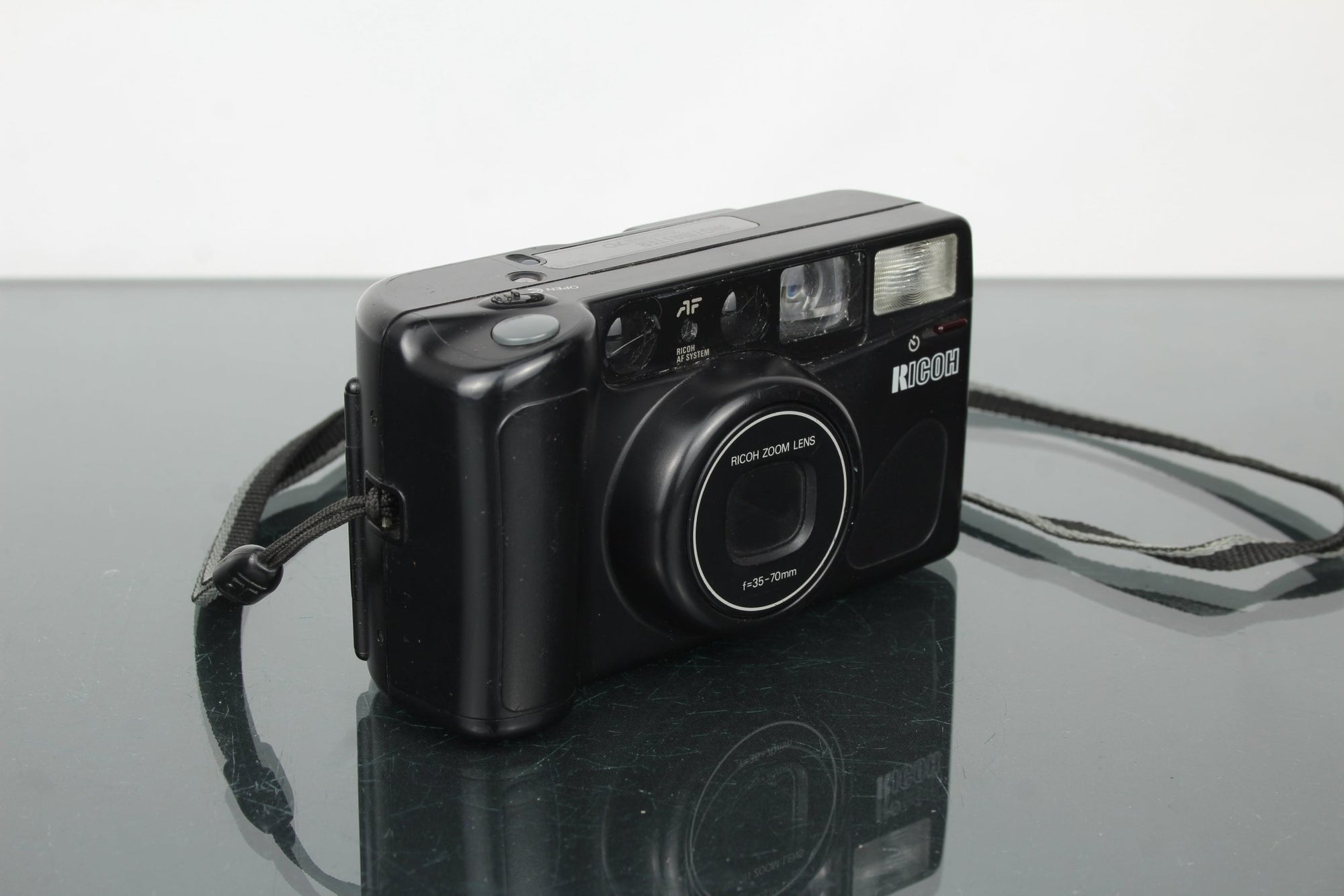 Ricoh Shotmaster Zoom 70 - Dutch|Thrift