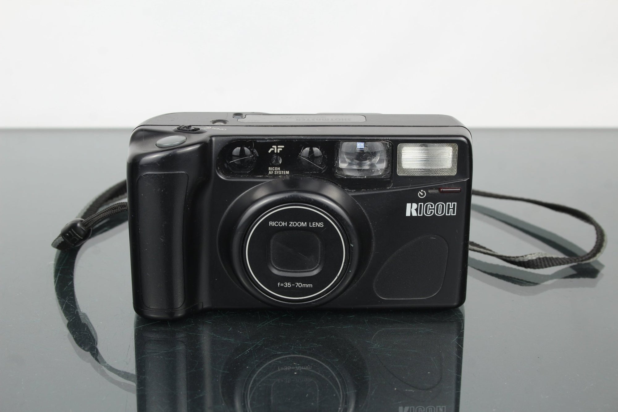 Ricoh Shotmaster Zoom 70 - Dutch|Thrift